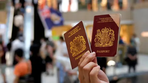 Reuters A protester showed BNO passports