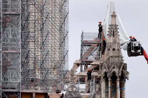 Reuters Work on top of Notre-Dame Cathedral, in Paris, France, 08 June 2020