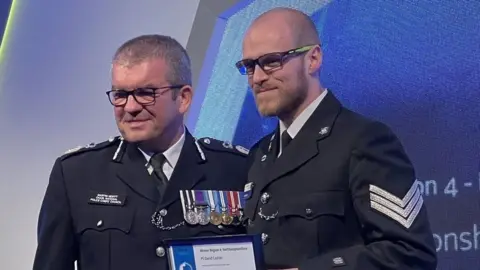 Northamptonshire Police Martin Hewitt, chairman of the National Police Chiefs' Council and Sgt Dave Cayton