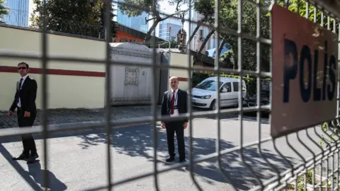 EPA Security personnel stand outside the Saudi consulate in Istanbul (2 October 2019)