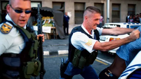 Getty Images An arrest by Johannesburg police