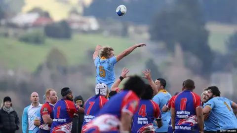 Getty Images male rugby team playing a game