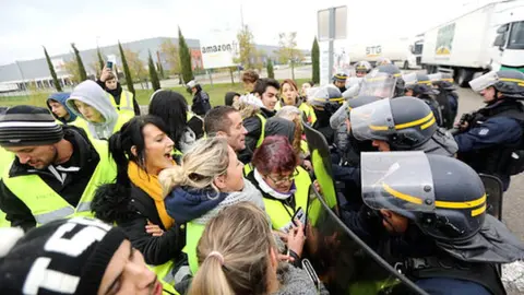 Fabrice HEBRARD/Maxppp/PA Media Yellow vest protestors outside an Amazon warehouse in France.