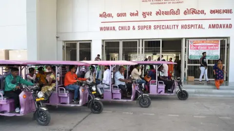 Getty Images e-rickshaws parked outside a Gujarat hospital