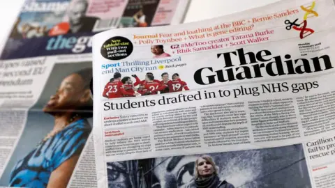The Guardian newspaper adopts tabloid format