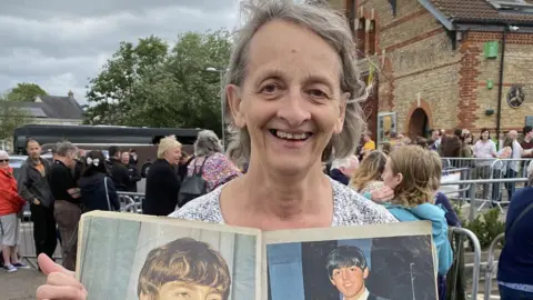 PA Media/Connie Evans Self-professed Beatles superfan Jane Lamb