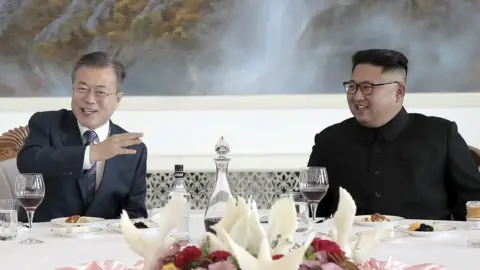 Reuters Moon Jae-in and Kim Jong-un