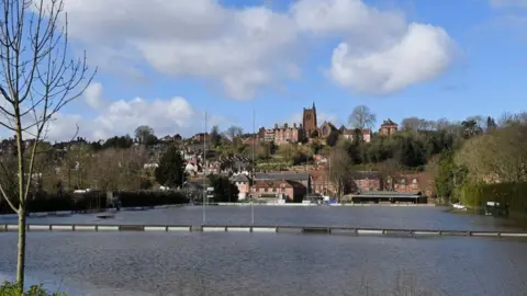 Reuters The flooded rugby ground of Bridgnorth RFC is seen beside the swollen River Severn