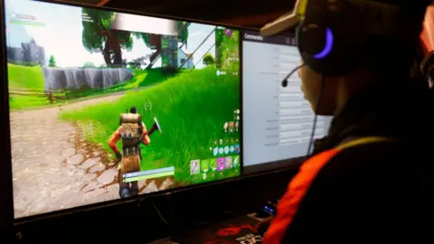 Getty Images A player plays fortnite