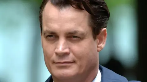 PA Tycoon Matthew Mellon leaves Southwark Crown Court in London, prior to the start of a computer hacking trial on Monday 23 April 2007.