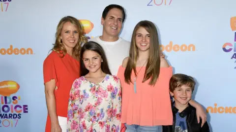 Getty Images Mark Cuban and his family