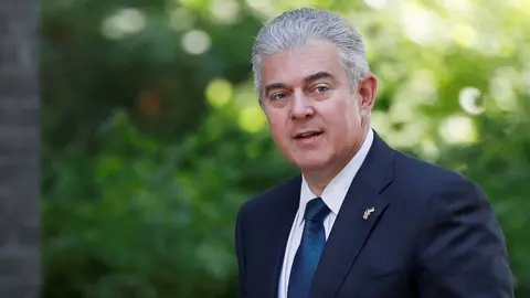 PETER NICHOLLS/REUTERS Brandon Lewis