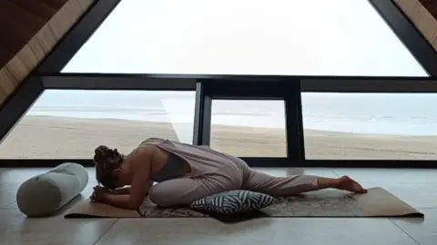 Millie Laws Millie Laws in a yoga pose