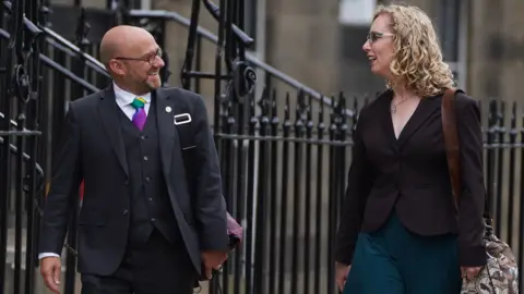 PA Media Patrick Harvie and Lorna Slater