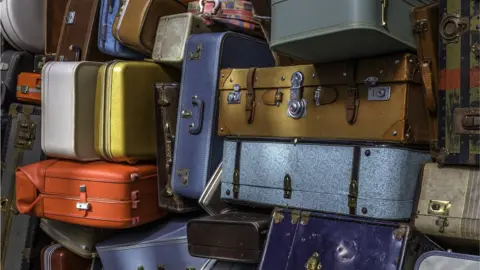 Getty Images Pile of old luggage