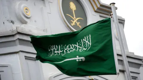 Getty Images A Saudi Arabia flag flies in front of the Saudi consulate in Istanbul, 13 October 2018