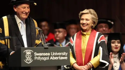 Swansea University Prof Richard Davies and Hillary Clinton