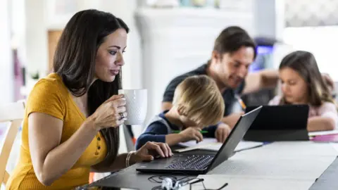 Getty Images Family working from home