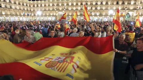 EPA Thousands gather at the Plaza Mayor in Salamanca, Spain, with Spanish national flags to support Spanish Security Forces deployed in Catalonia. 4 October 2017
