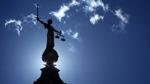 Getty Images Lady Justice statue at the Old Bailey