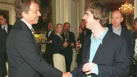 PA Then PM Tony Blair meets Noel Gallagher in Downing Street in 1997