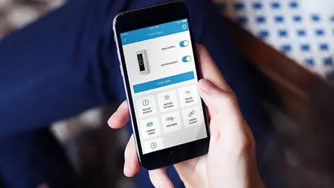 Amazon Ring  Customer holding the Front Door screen of the Ring app