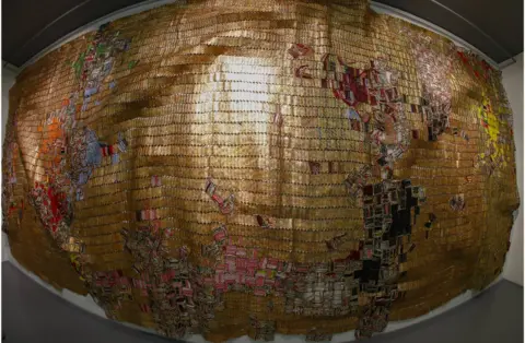 EPA An art work by Ghana artist El Anatsui titled "Dissolving Continents" using Aluminium and Copper at the Zeitz Museum of Contemporary Art Africa (Zeitz MOCAA).