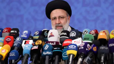 Reuters Ebrahim Raisi speaks to reporters in Tehran, Iran (21 June 2021)