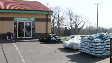 A coal supply business within the Dairy Farm shopping complex close to Twinbrook where Damein Walsh was killed