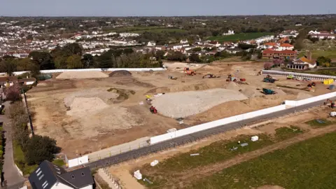 An aerial view of a building site.