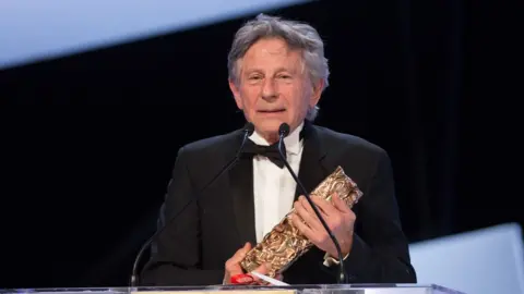 Getty Images Roman Polanski receives the Best Director award for 'Venus in Fur' on stage during the 39th Cesar Film Awards 2014