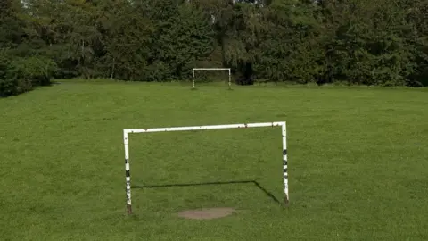 Getty Images Goalposts in a field