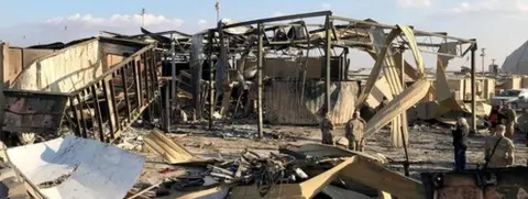 Reuters Photo from 13 January of US soldiers inspect the site where an Iranian missile hit at Ain al-Asad air base in Anbar province, Iraq.
