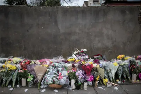 Getty Images Flowers at the scene Tanesha Melbourne died