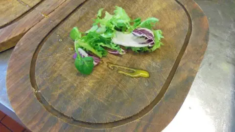 Birmingham City Council Wooden boards in use at Ibrahim's Grill and Steak House Ltd