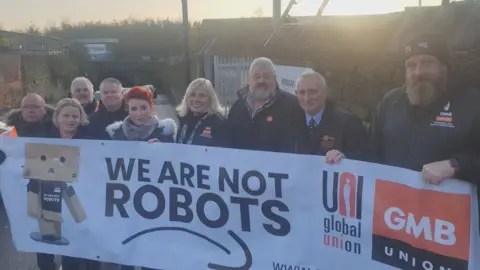 GMB Protesters outside an Amazon warehouse