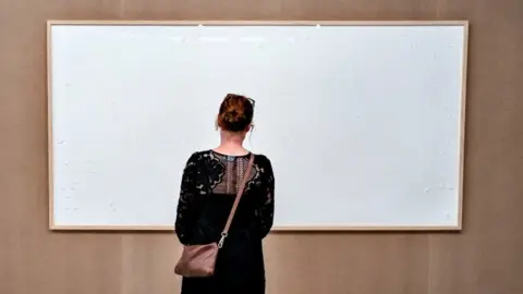 Danish museum wants artist to pay back money after producing blank