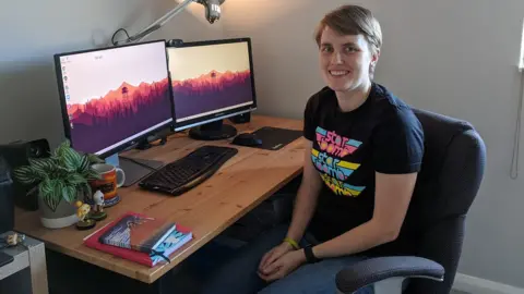 Sarah Caisley  Sarah Caisley at her home desk