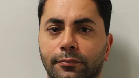 Met Police Mugshot of Kaygusuz