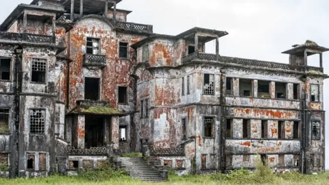 Getty Images Burned remains of casino and hotel, Bokor Cambodia (Nov 2017)