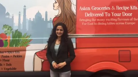 Jyoti Patel in front of her delivery van