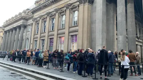 A queue of people hoping to get tickets on the day had formed by 07:30 on Sunday