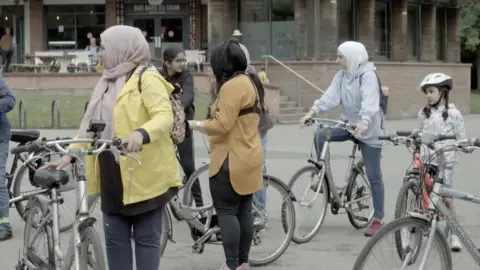 Shazia Chaudray with women cyclists