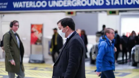 Reuters Man wearing face mask