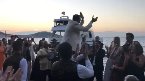 Emma Winberg At the wedding James was carried on the shoulders in a traditional Arada dance