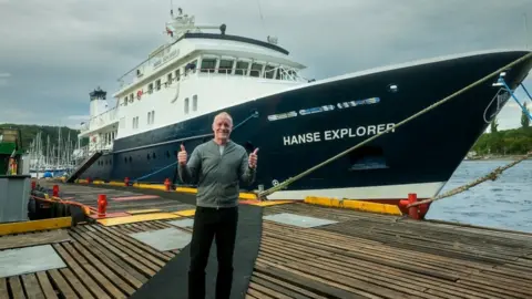Chris Brown Chris Brown in front of the Hanse Explorer
