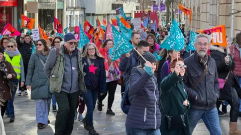 Simon Dedman/BBC NEU teachers marching in Chelmsford