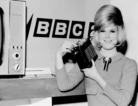 Getty Images Dusty Springfield at the Ideal Home Exhibition, Olympia, where she was given a Baird radio by Radio Rentals