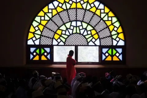AFP Muslim worshipers attend prayer at the Uganda National Mosque in Kampala, Uganda, on 4 June.