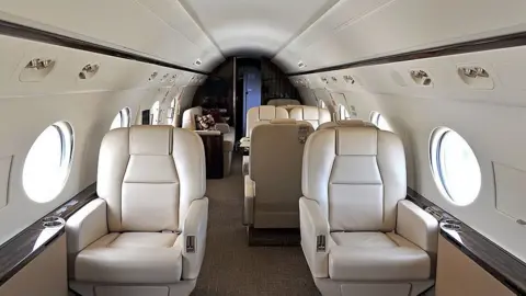 Getty Images The interior of a private jet.